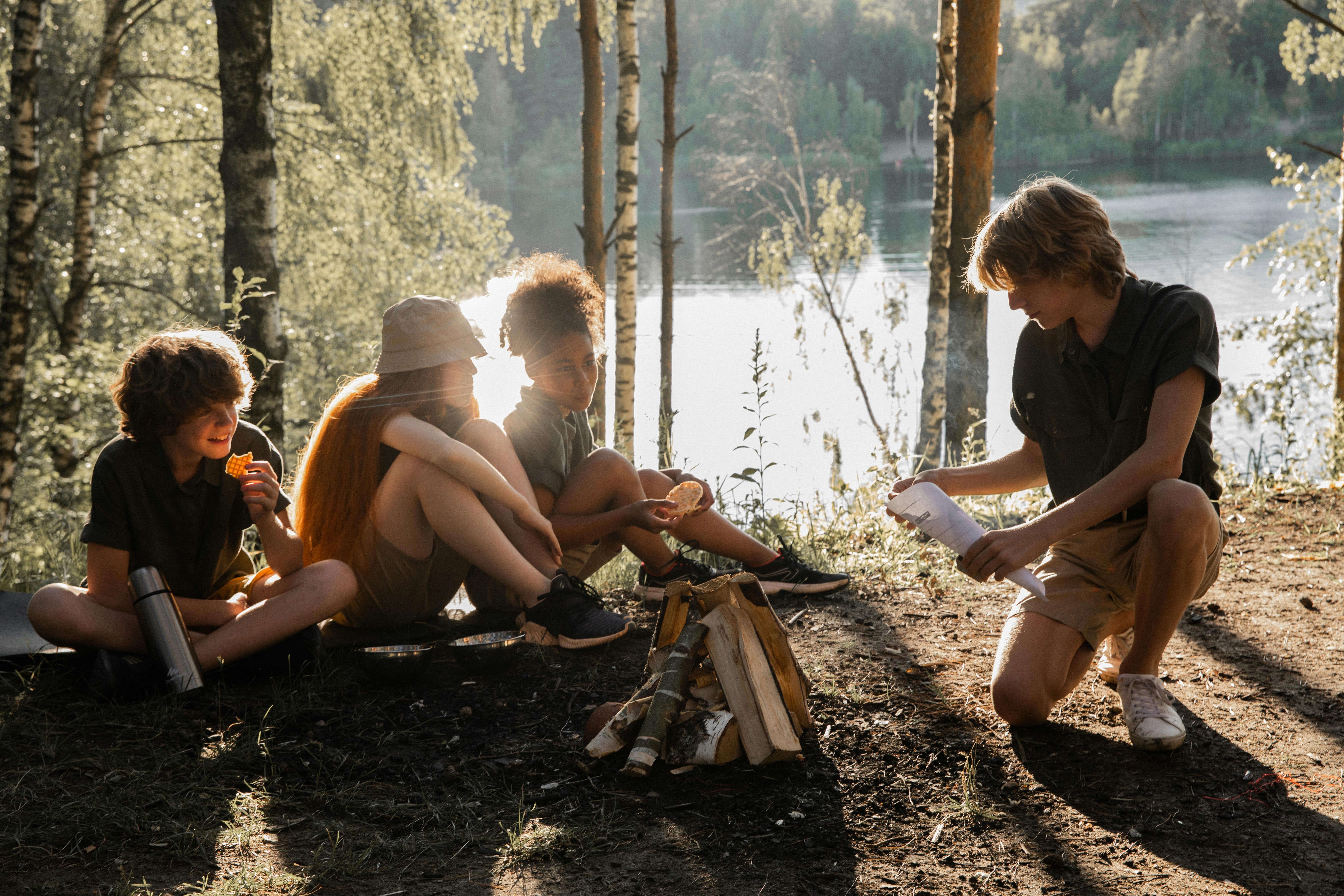 Scout leaders teaching youth